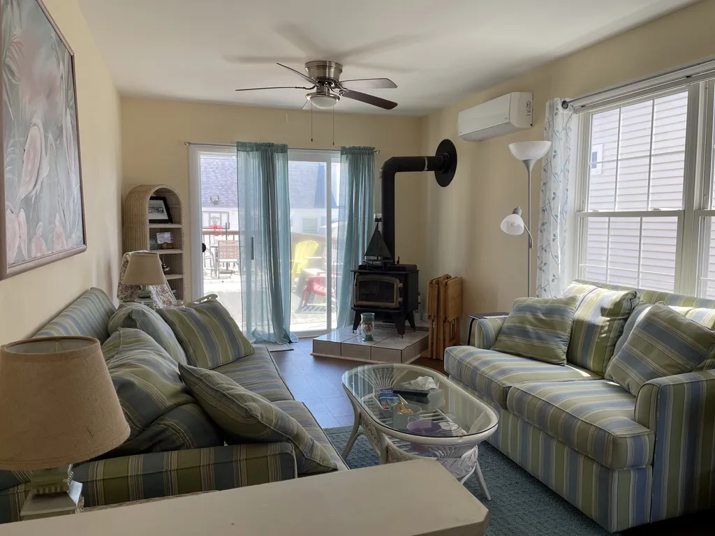 Family room with sliders to huge deck