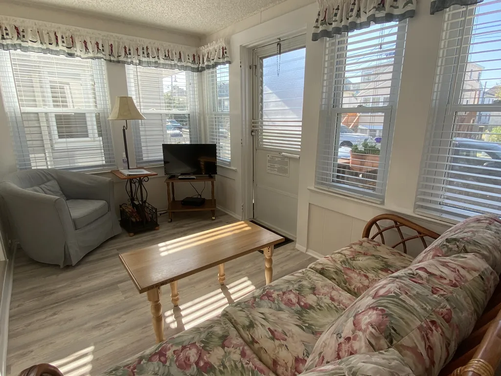 Apt. Porch Entrance with TV