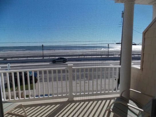 Ocean view sitting on master  bedroom bed!