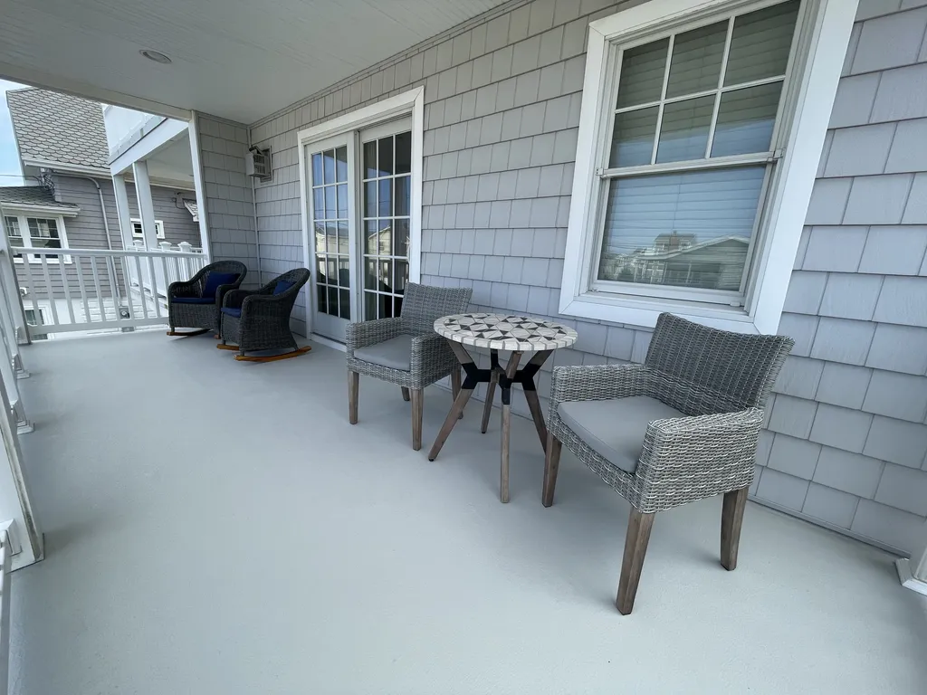 Front Deck off LR w/ Rockers and Cafe Set