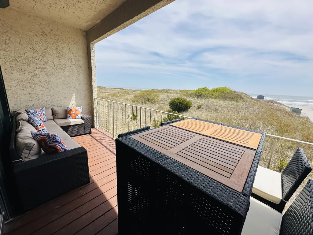 Sectional and dining table on 2nd floor oceanfront deck!