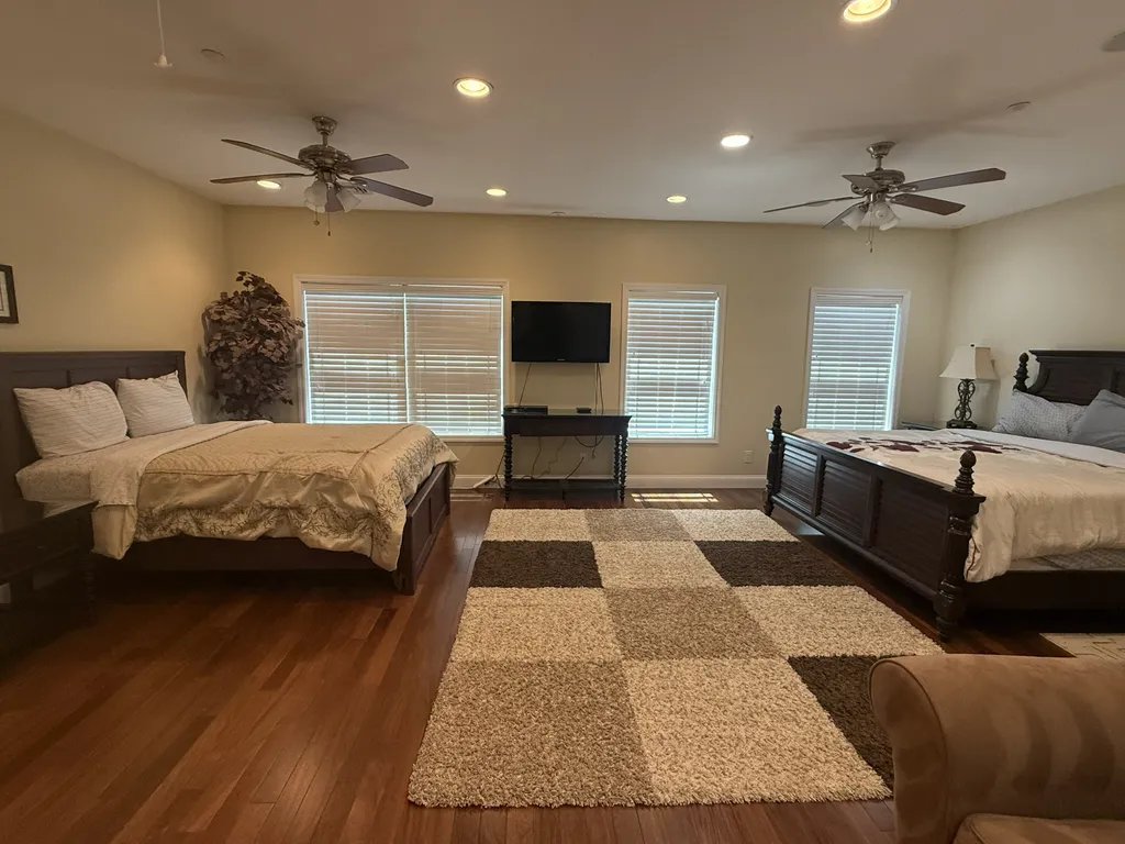 Fourth Floor Master Bedroom with a King and Queen Bed