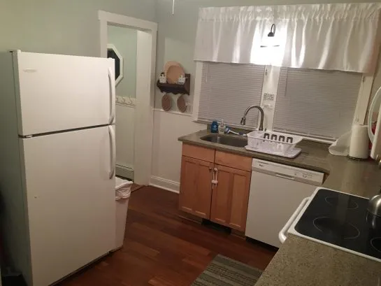 Kitchen has full size fridge and new quartz countertops &amp;amp; undermount sink and fixture!