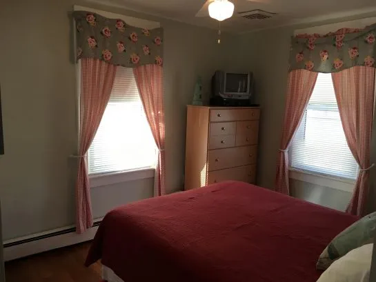 Third bedroom has shabby chic elegance