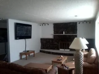 The livingroom has a 65 HD television with cable and 2 full-siz&amp;quot;