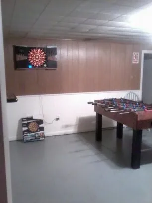 The gameroom also has an electronic dart board.