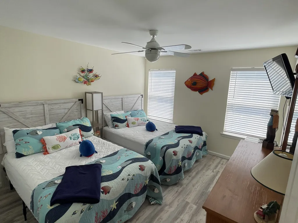 Bedroom 3, 1 queen, 1 double, flat screen, hugh closet for your clothes stocked with extra pillows, blankets, air bed 