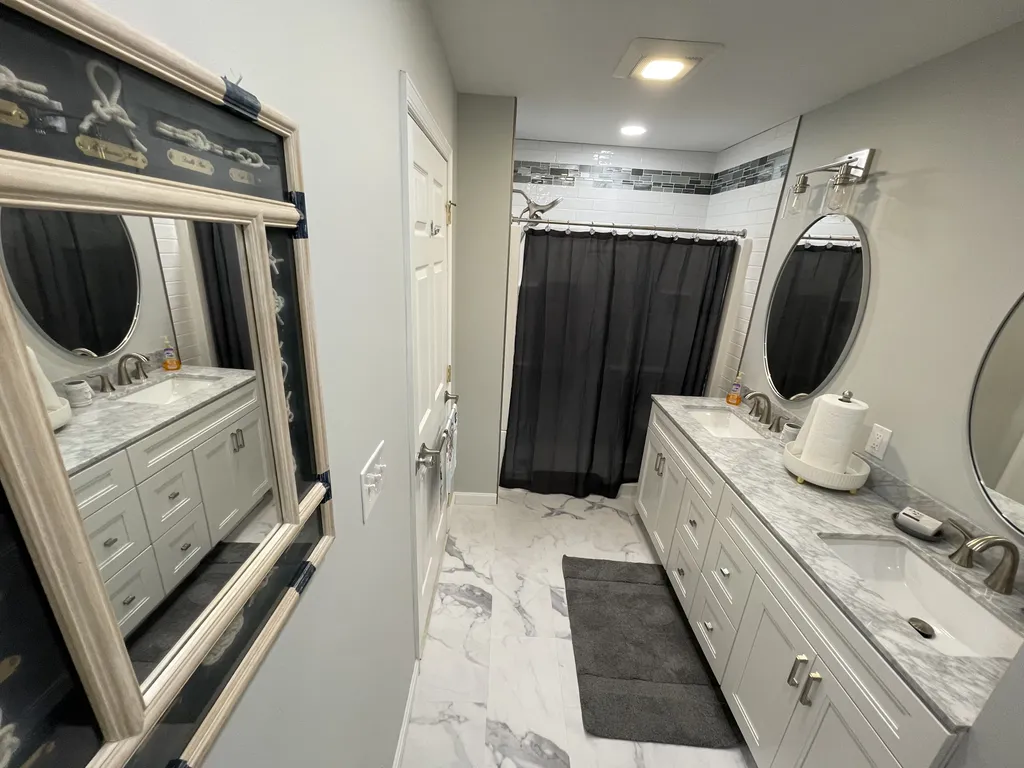 New Master bath, walk in shower with seat, large double vanity, linen closet 