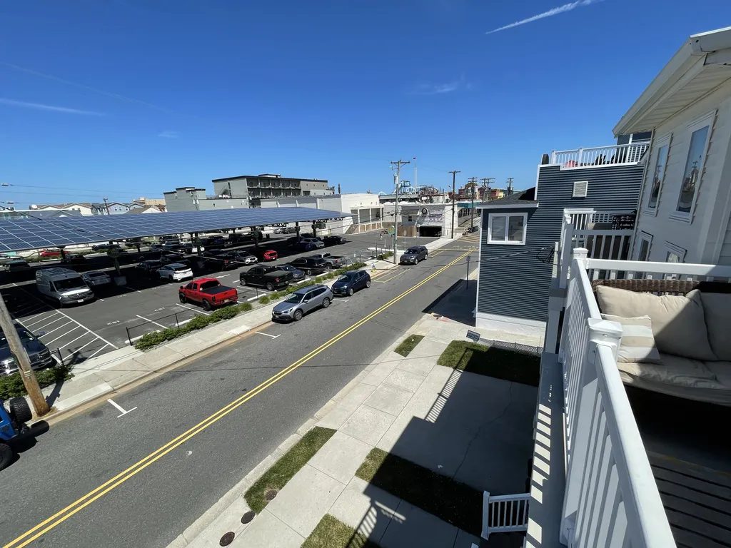 3RD from beach, large furnished deck overlooking all the comings and gorings of the Wildwoods, 2 blocks south of 26th street? Just park and stay 