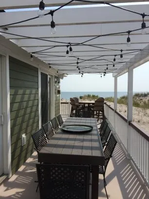 Outside entertaining space...Southside deck dining table...seats 10