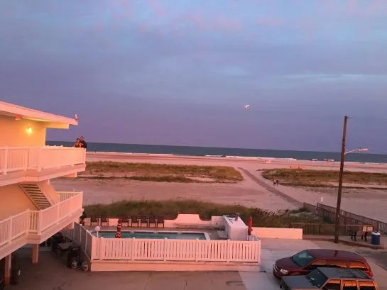 Beautiful beach at sunset from balcony
