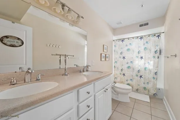 HALL BATH #2:  Two sinks, Tub/Shower