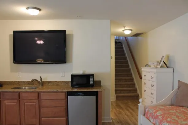 View of wet bar in first floor master suite.