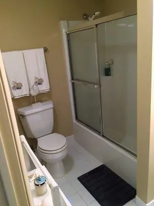 Bathroom with tub and shower