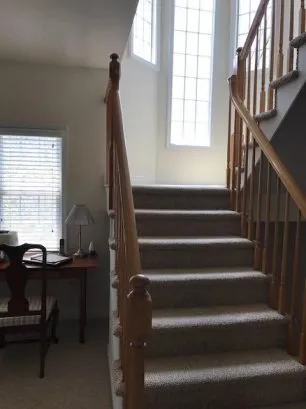 desk area and stairs to third floor