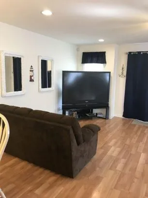 Living Room with a 67&amp;quot; Big Screen TV - DVD - 100 Channel Cable