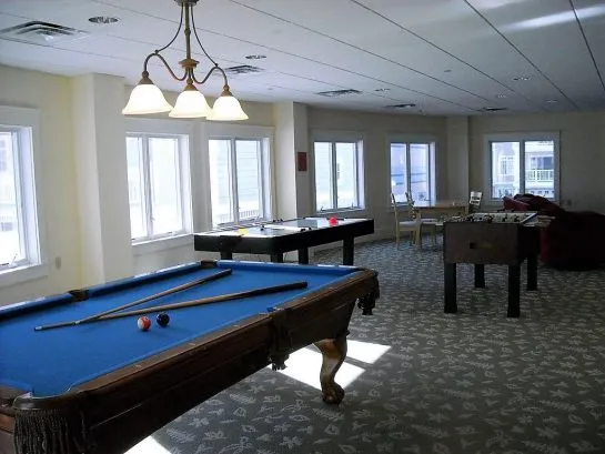 Enjoy a Game of Pool on the 1st Floor while the Kids Are Playing Air Hockey