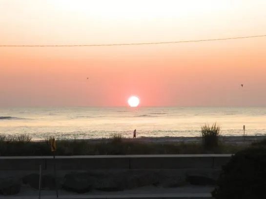 Sunrise from kitchen/living room/back deck