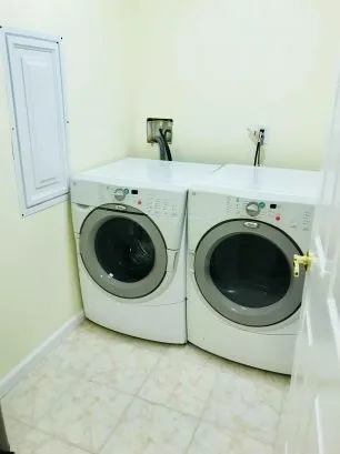 Laundry Room with Front Loader Washer and Dryer