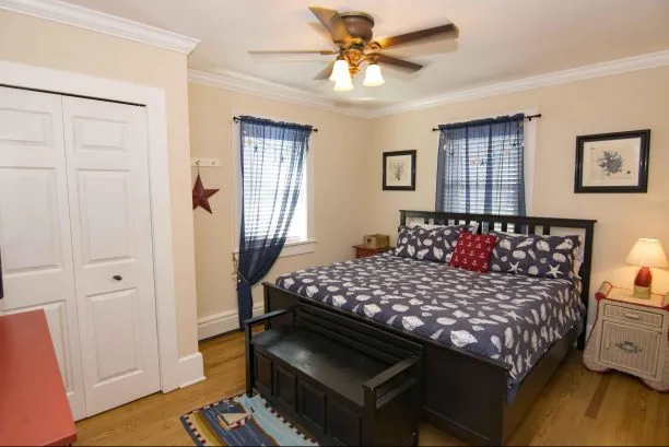 Spacious main floor bedroom with king bed