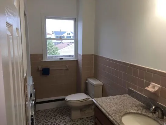 Unit 2 Main Bath - Full Bath w/ washer/dryer