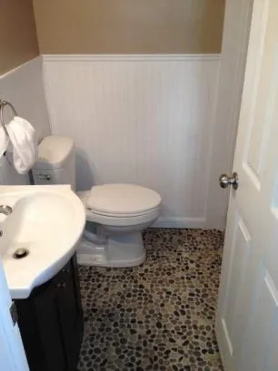 Ground floor full bathroon makes for easy cleanup after a day at the beach