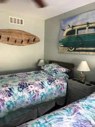 Girls' room with 2 twin beds and TV