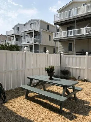 Set up snack time at the picnic table in the fenced in back yard