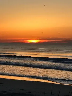 Start your day with a sunrise at the beach, only 1.5 blocks from the property. Enjoy the views!
