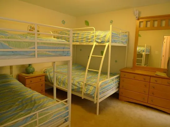 Third bedroom with two sets of bunk beds (twin over full and twin over twin)