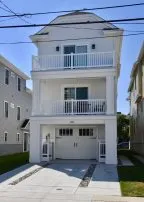 Private balconies off 2 Jr. Primary bedrooms, Parking for 2 vehicles