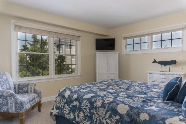 2nd floor rear bedroom overlooks the private pool