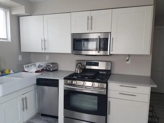 kitchen with gas stove &amp;amp; dishwasher