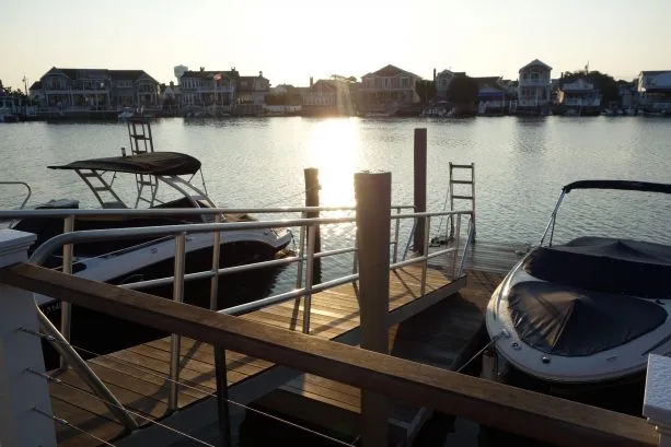 Floating dock and our boat slip (on the right), with additional 4 feet of space on far side for launching kayaks and other water toys.