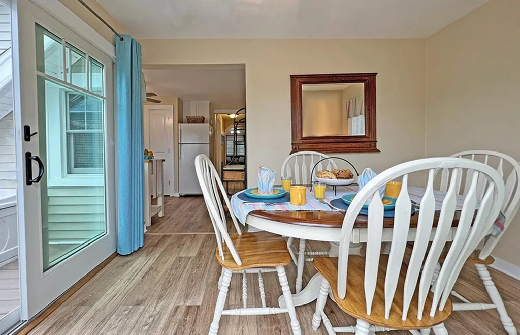 View into dining room and kitchen from the deck.