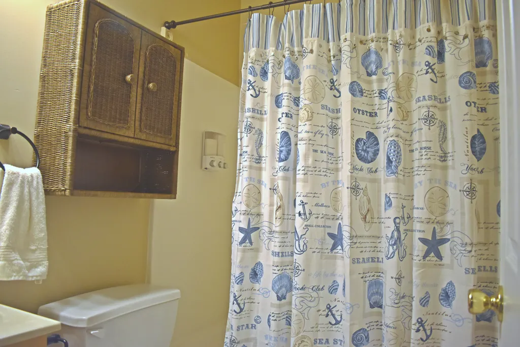 Hall Bathroom with shower gel, shampoo and conditioner dispenser