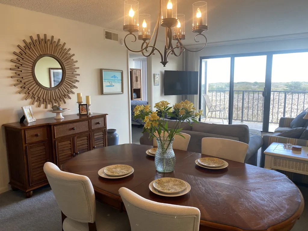 Dining room and living room  with balcony 