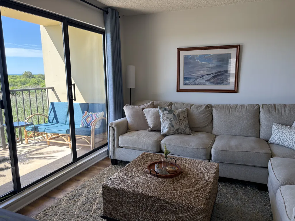 living room with sliders to balcony