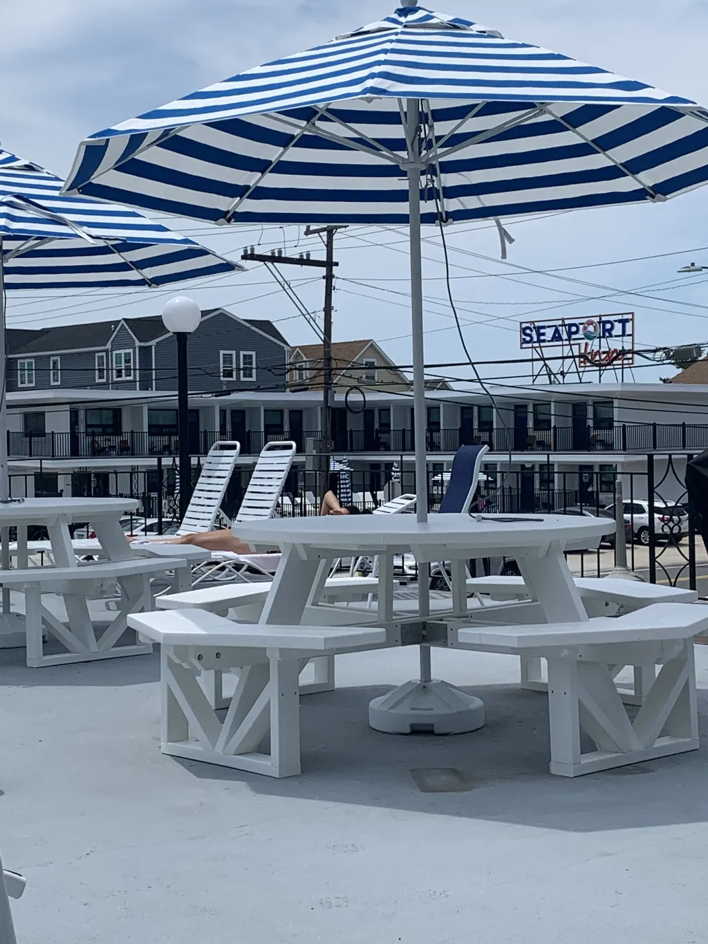 Tables on upper deck near grill