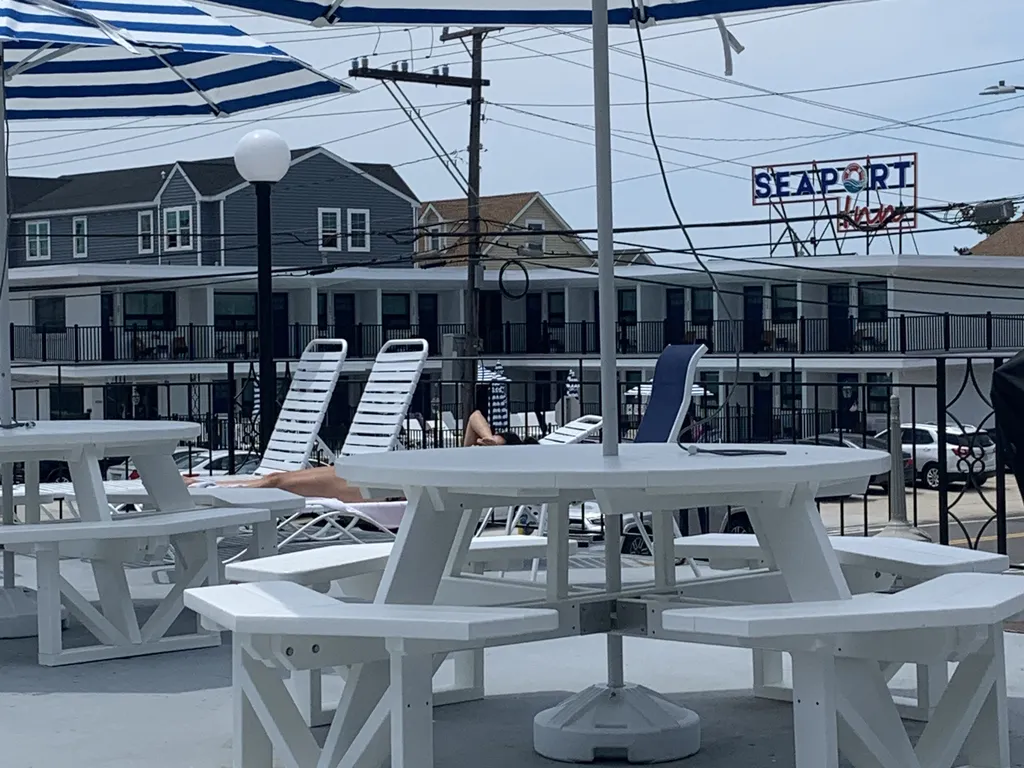 Tables on upper deck near grill