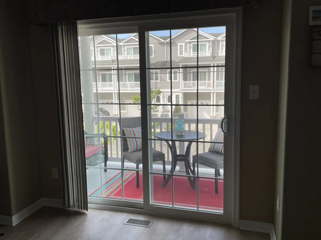 Spacious outside deck off living room through sliding doors - great vantage point for viewing Friday night fireworks