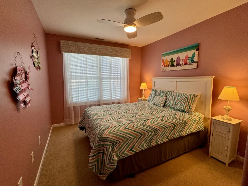 3rd floor bedroom with Queen bed. Sleeps 2.