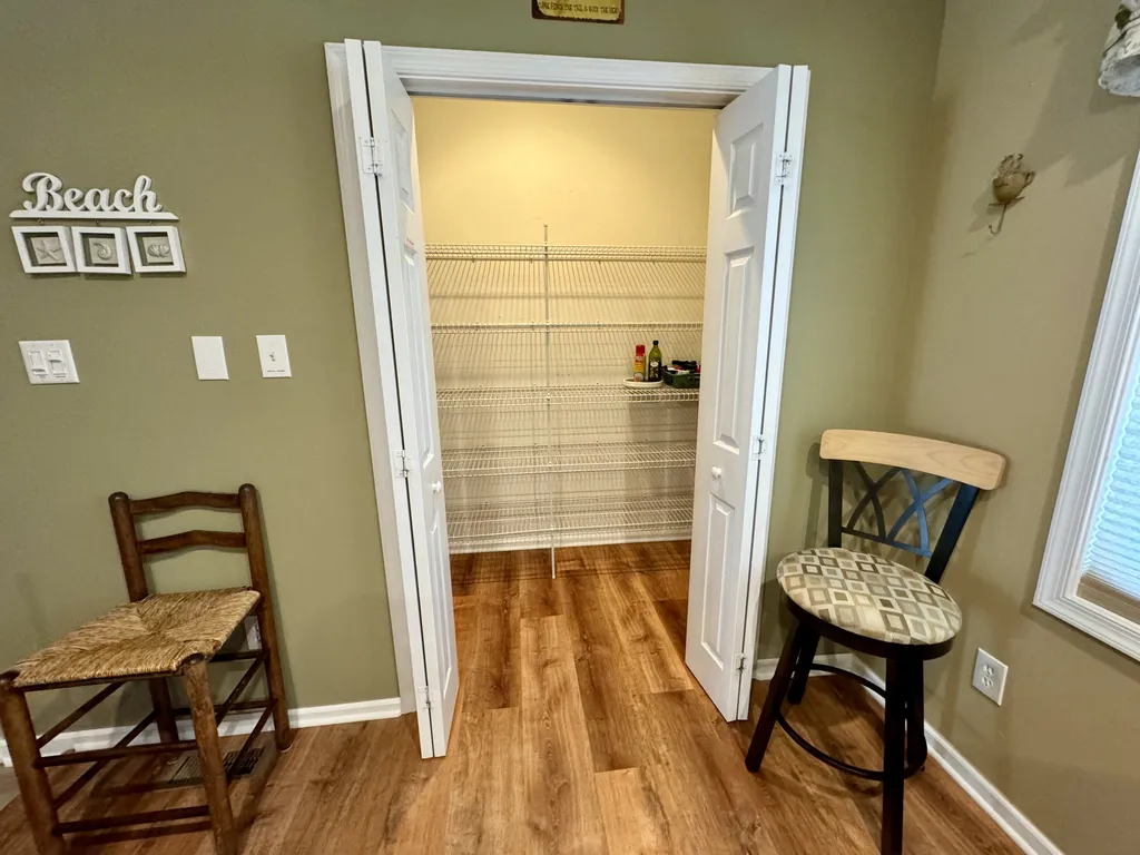 Oversized walk-in kitchen pantry to store your canned goods, paper products, spices, and anything else. A great amenity to have in any kitchen!