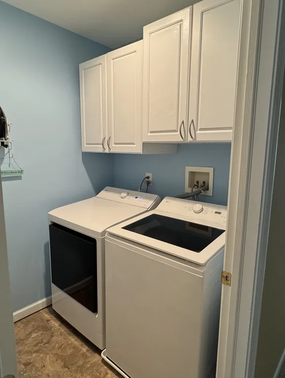 Laundry Room with full-size washer/dryer, iron and ironing board