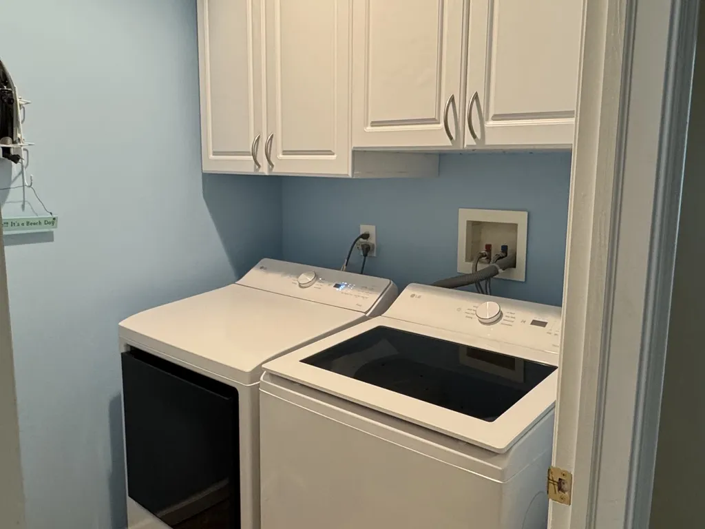 Laundry Room with full-size washer/dryer, iron and ironing board
