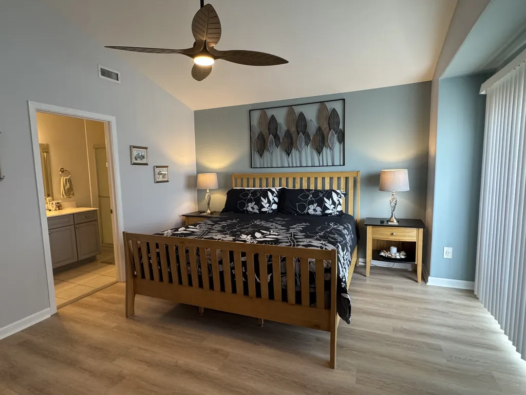 Master Bedroom with King bed, vaulted ceiling, private full bath and private outside deck. Sleeps 2.
