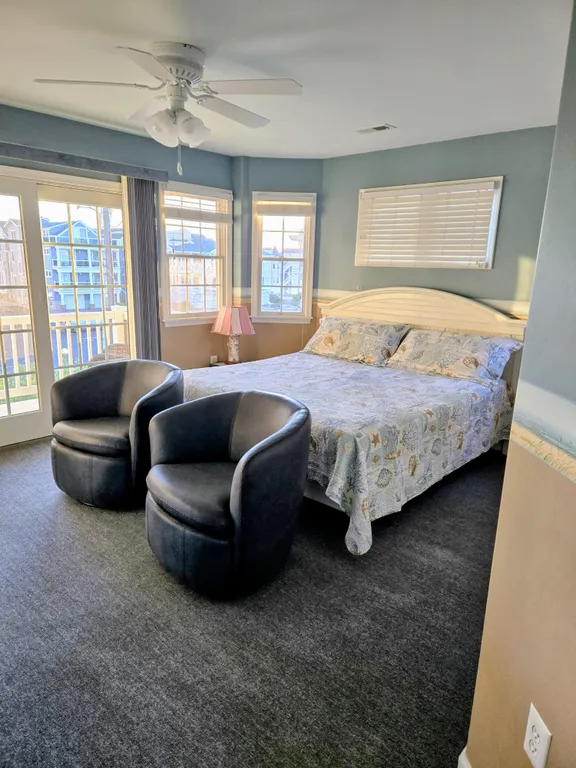 2nd floor king bedroom with 2 swivel chairs