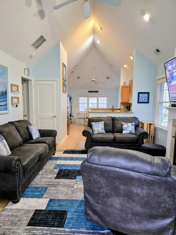 Living Room facing kitchen and dining area