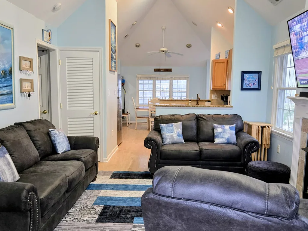 Living Room facing kitchen and dining area