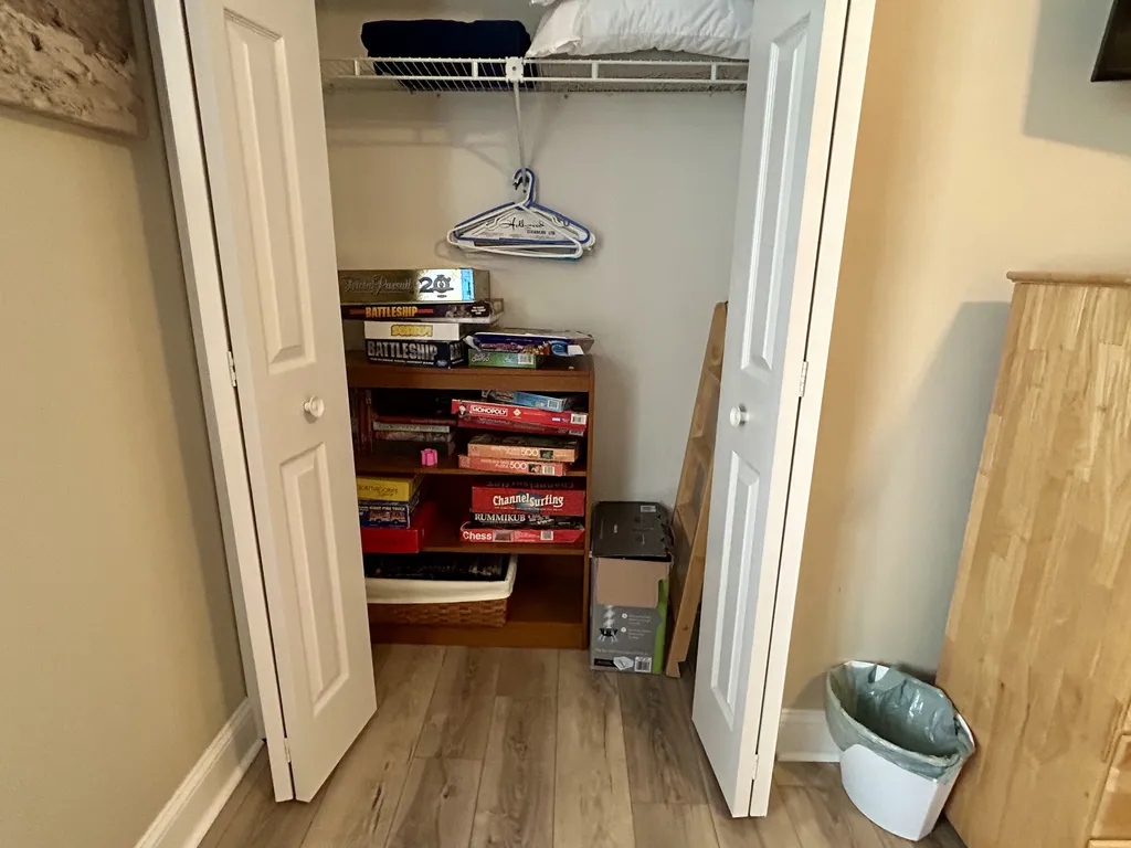 Closet to third bedroom with puzzles, games videos 